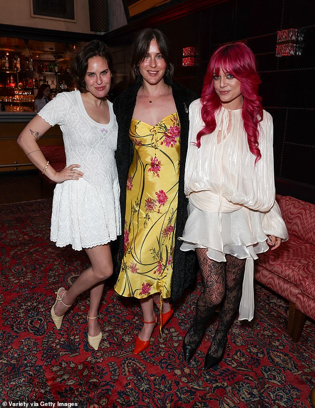 The musician, 34, looked stunning in the stylish ensemble as she posed with her sister, 32, and the British writer at the star-studded event, held at the TCL Chinese Theatre (L-R Tallulah, Scout, and Florence)