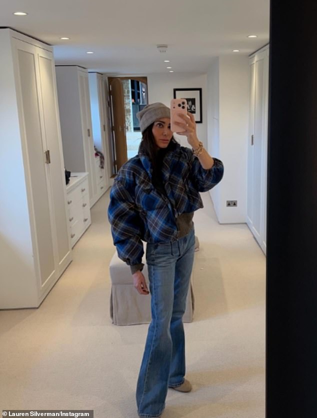 Lauren snapped a selfie showing off her lavish walk-in wardrobe