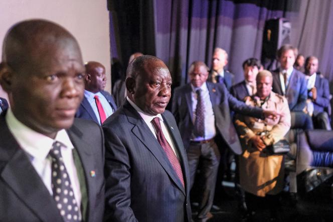 South African Foreign Minister Ronald Lamola (left) and South African President Cyril Ramaphosa (center) during a meeting of G20 foreign ministers in Johannesburg, South Africa, February 20, 2025.