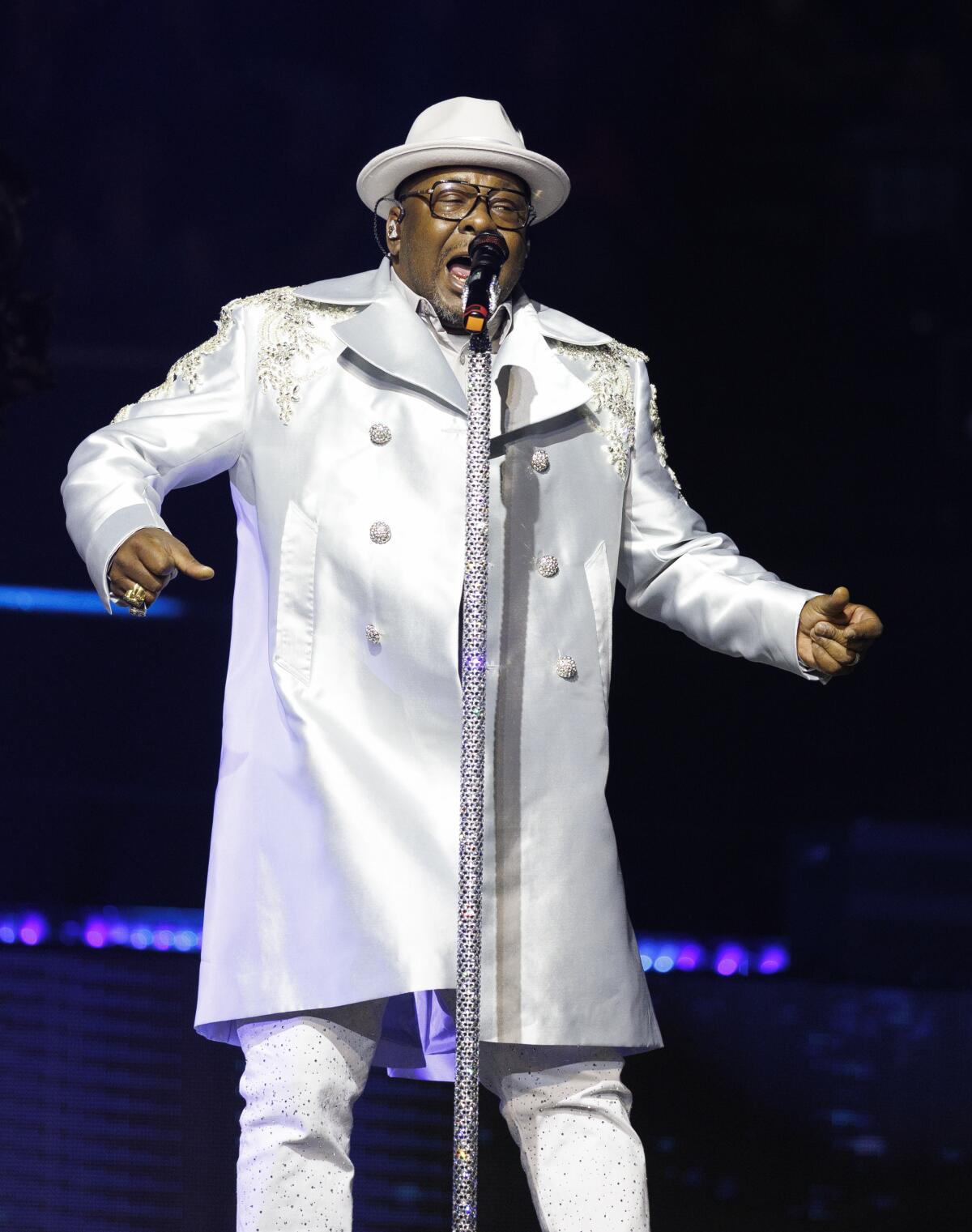 Bobby Brown performs with the New Edition