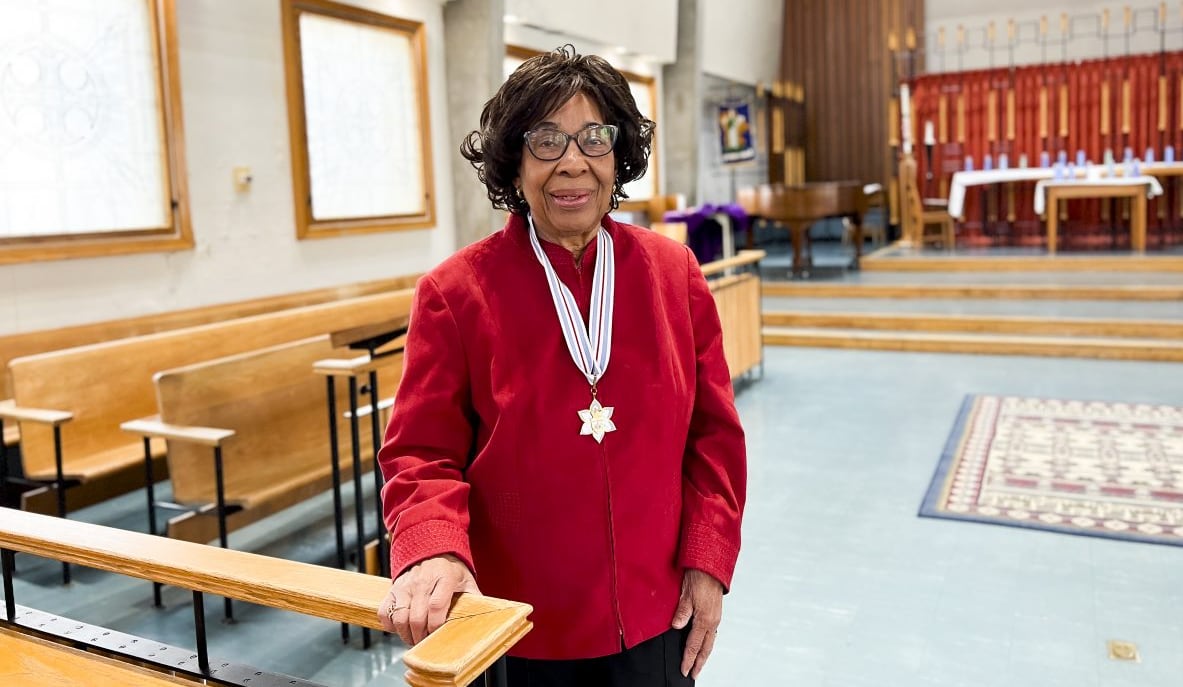 A photo of Dr. June Marion James adorned with a medal