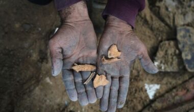 A father in Gaza searches rubble for his family's remains after Israeli air strike destroys home