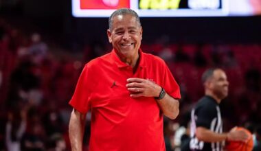 Fans and students cheering in The Cage inside Fertitta Center