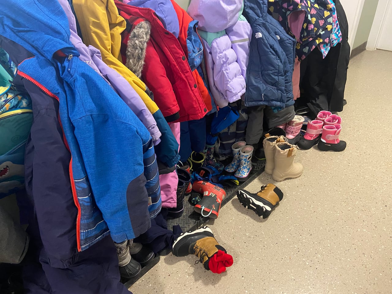 image of children's boots and coats