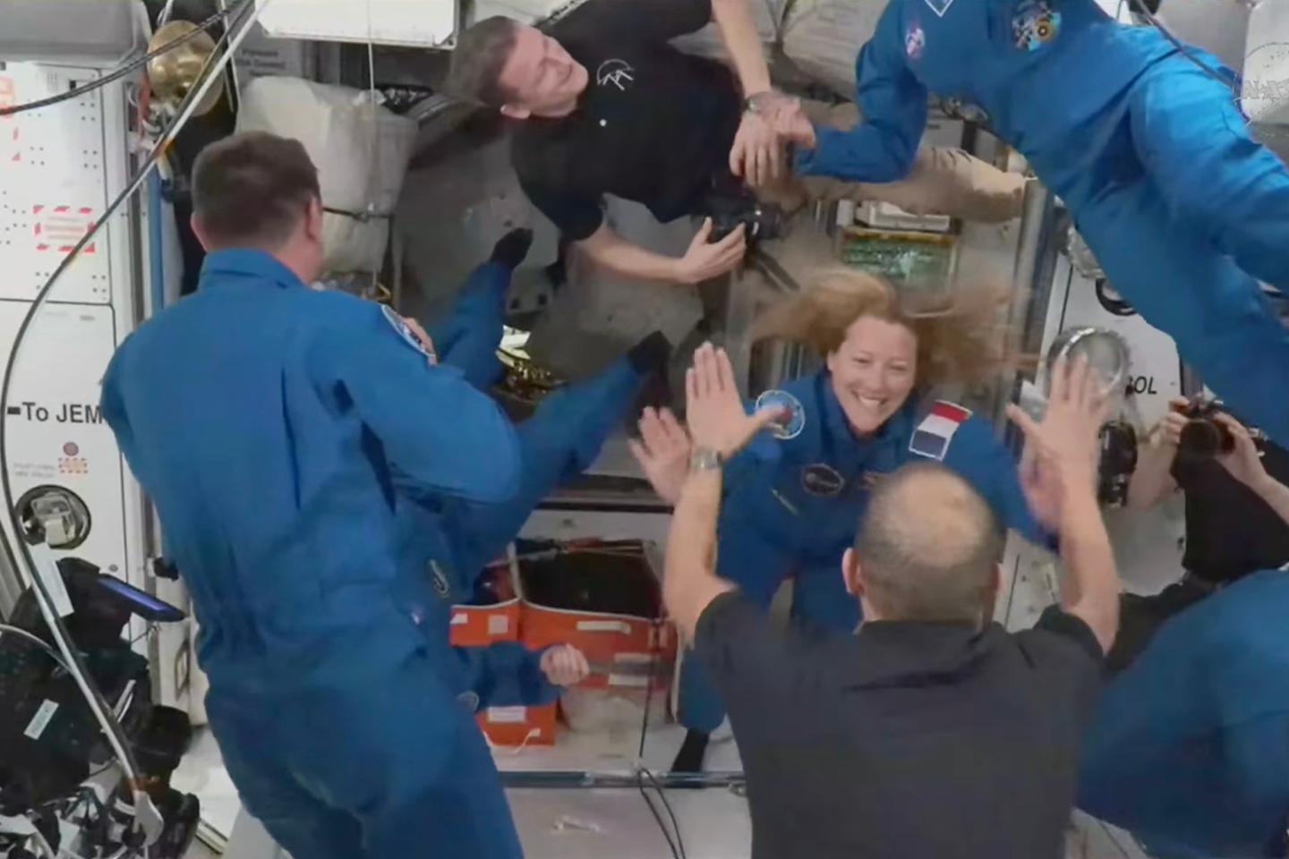 International crew arrives at space station, carrying France’s second woman in space