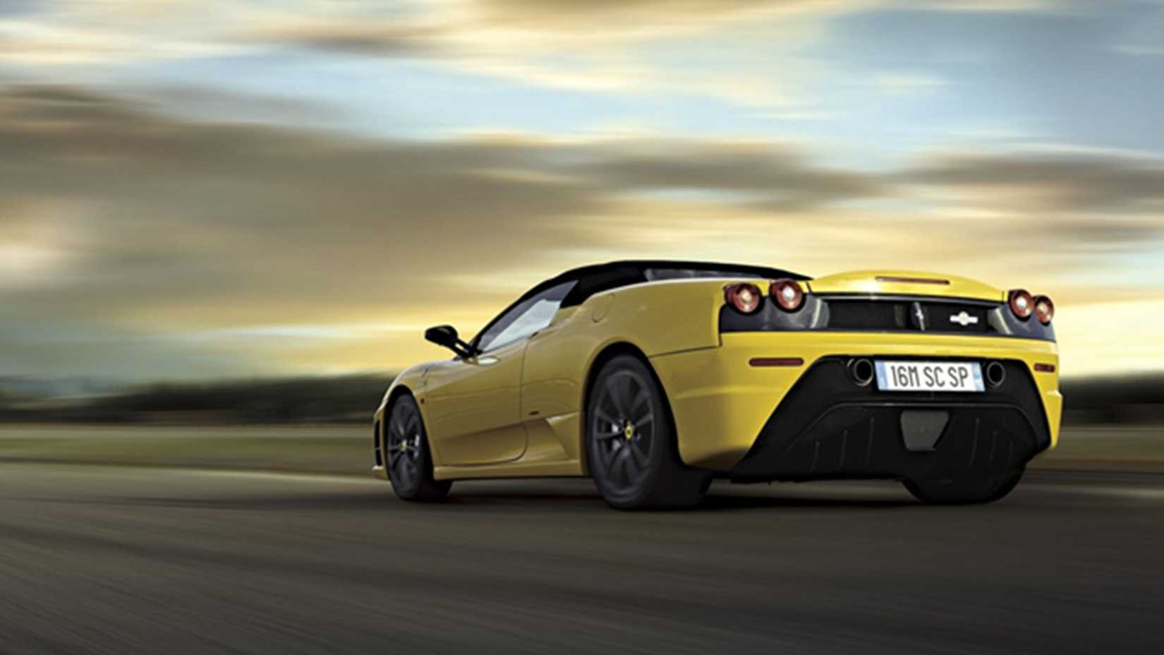 Yellow 2009 Ferrari F430 Scuderia Spider 16M rear