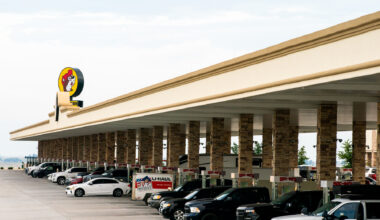 historic imposing building with several stories on a city street
