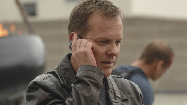 Jack Bauer holds a cell phone to his ear
