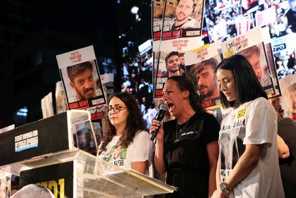 Lishay Miran-Lavi speaking at a protest calling for the immediate release of the hostages in May.