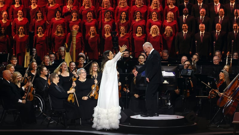 World-renowned vocalist Ivete Sangalo greets director Mack Wilberg following her segment during the "Songs of Hope" tour by The Tabernacle Choir and Orchestra at Temple Square at Ginasio do Ibirapuera in São Paulo, Brazil, Friday, Feb. 27, 2026.