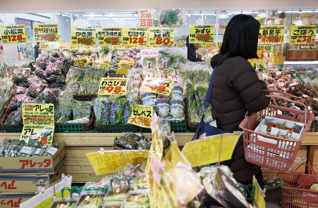 A shopper visits a supermarket in Tokyo last month. Japan currently applies an 8 per cent consumption tax to most food and drink purchases. Photo: Kyodo