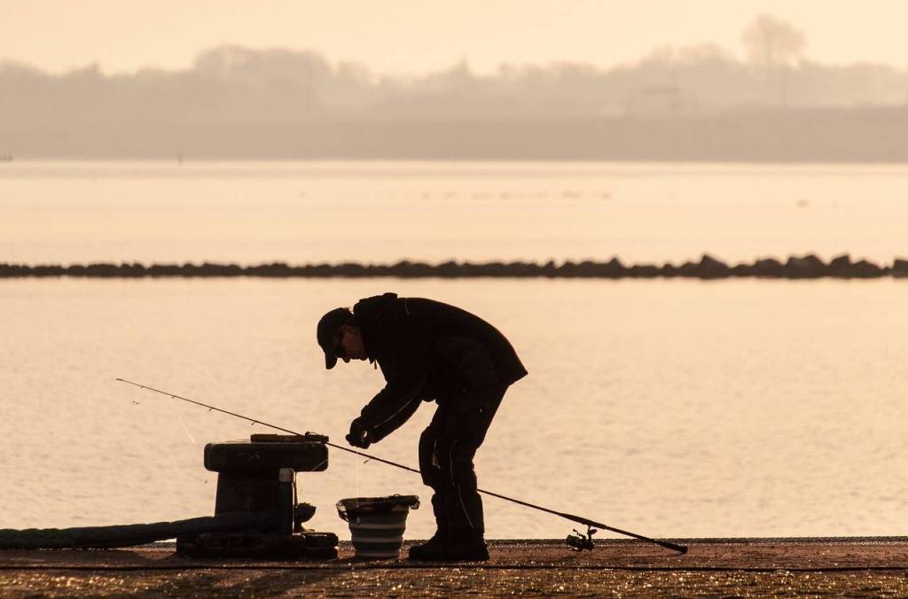 A man sets out to fish. File photo