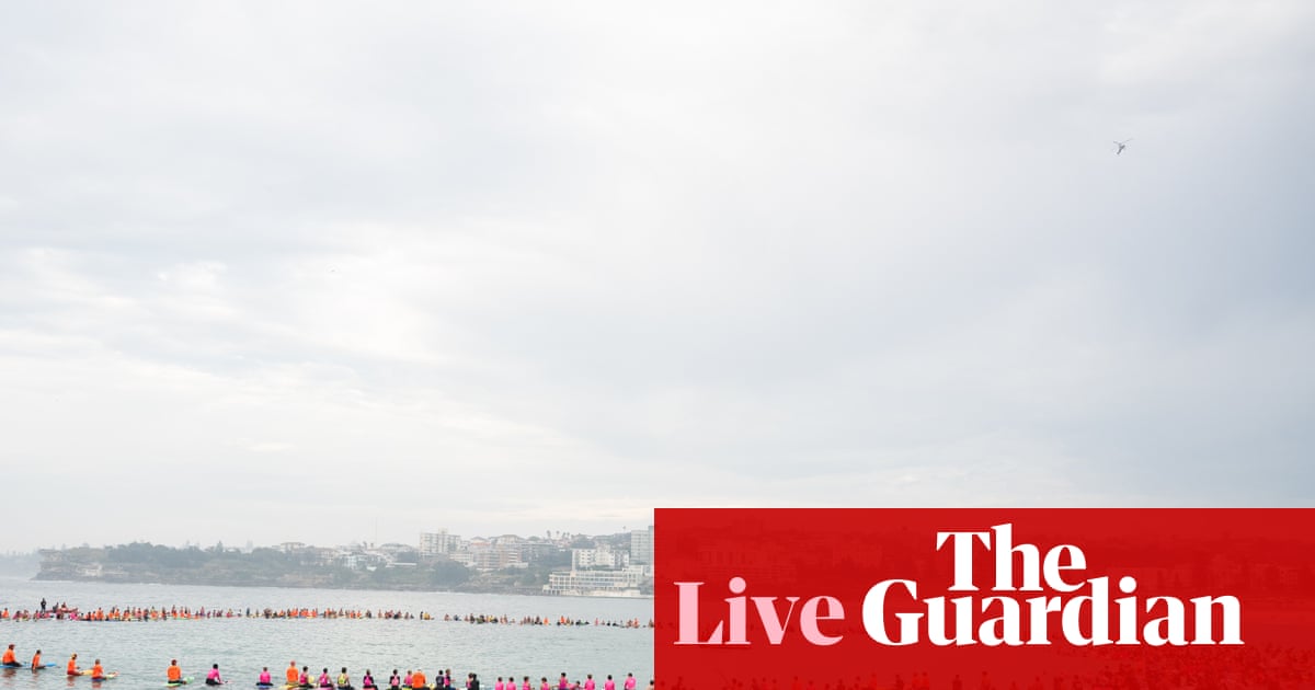 Australia news live: Hundreds of surfers paddle out in memory of 12-year-old Sydney boy killed by shark; Canavan rules out bid for Nationals leadership | Australia news