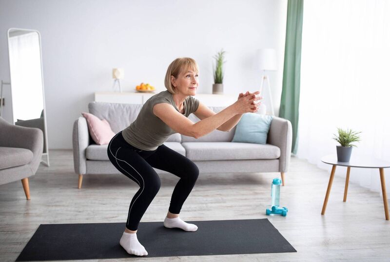 Squats are a great way to reactivate glutes if you've done lots of sitting. Picture: Alamy/PA.