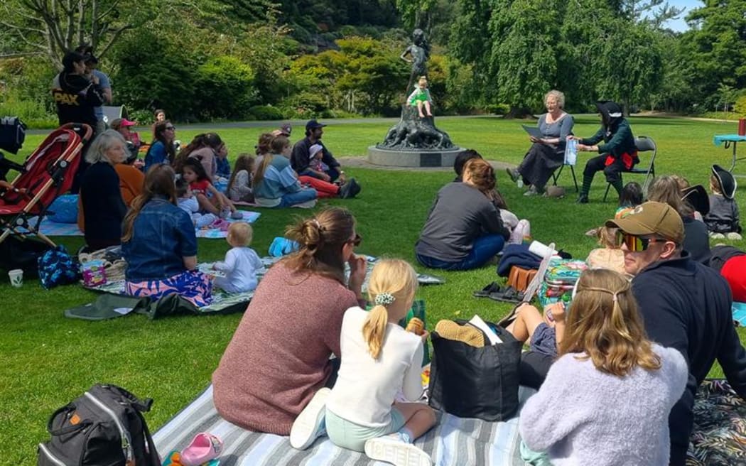 Pirates, Wendy Darling and a Tinker Bell or two joined the Peter Pan storytime picnic as Catherine Lee read them a story. Photo: Tess Brunton