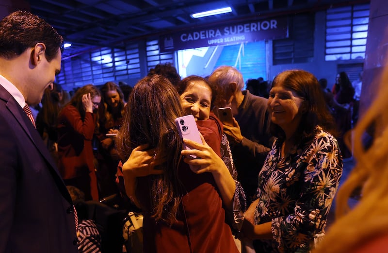 Tabernacle Choir at Temple Square members greet guests outside the concert hall following a performance of the "Songs of Hope" tour concert by The Tabernacle Choir and Orchestra at Temple Square at Ginasio do Ibirapuera in São Paulo, Brazil, Friday, Feb. 27, 2026.