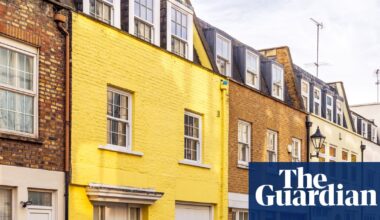 Price of average UK home passes £300,000 for first time, Halifax says | Housing market