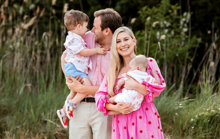 The author poses with her family today.