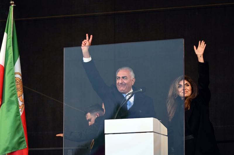 Reza Pahlavi and his wife Yasmine during a rally in Munich to denounce the Iranian government's crackdown on recent protests. Photograph: Fariha Farooqui/EPA