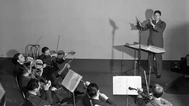 Bernard Herrmann, conductor with the Columbia Studio Orchestra