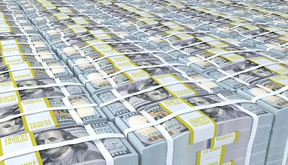 Piles of $100 bills bound into bricks.