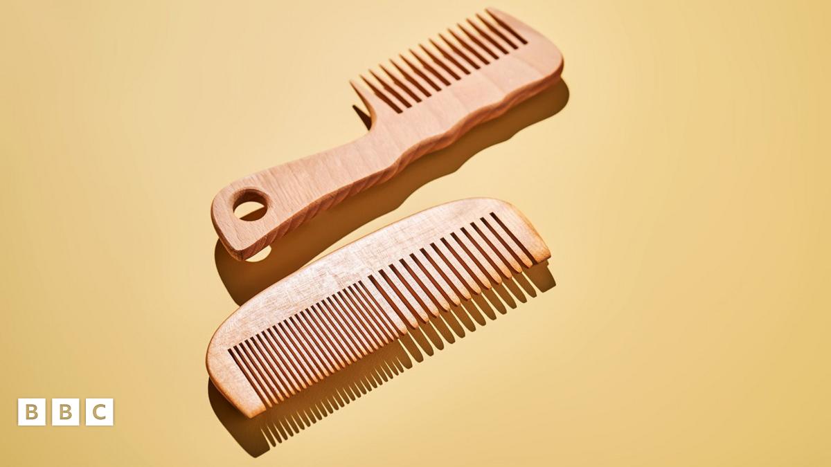 Two wooden combs on a yellow background