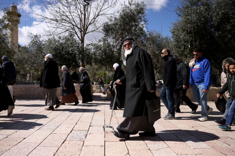 Muslim worshippers make their way through the narrow streets of the old city of Jerusalem to the Al-Aqsa Mosque to attend the second Friday noon prayers of the holy month of Ramadan