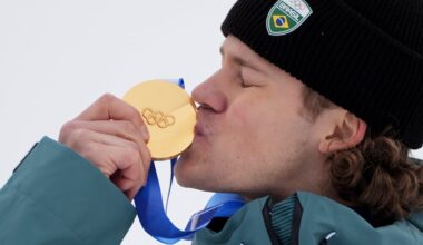 It was a kiss decades in the making, as Brazil's Lucas Pinheiro Braathen smooches his gold medal after winning Saturday's giant slalom in Bormio, Italy, for South America's first medal at a Winter Olympics.