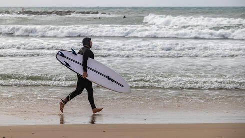 warmer today, drizzle Friday, rain possible in north Saturday