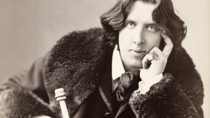 Richard Ellmann on Oscar Wilde: “Now beyond the reach of scandal, his best writings validated by time, he comes before us still, a towering figure, laughing and weeping, with parables and paradoxes, so generous, so amusing, so right.” Photograph: Napoleon Sarony/Getty Images