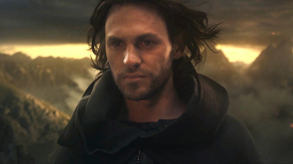 Charlie Vickers looking at what will become Mordor in The Rings of Power Season 1