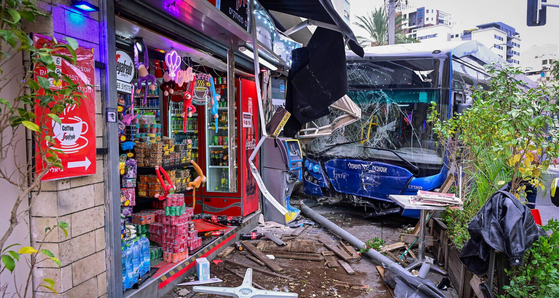 10 injured, one of them seriously, after bus crashes into store in Ramat Gan