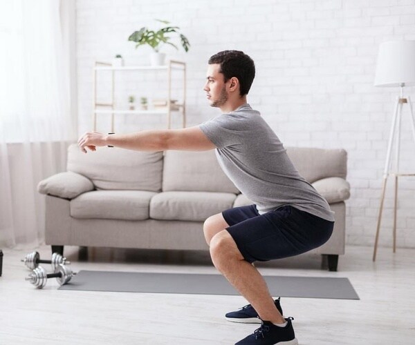 man exercising at home