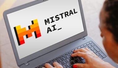 The Mistral AI logo is seen displayed on a laptop screen.