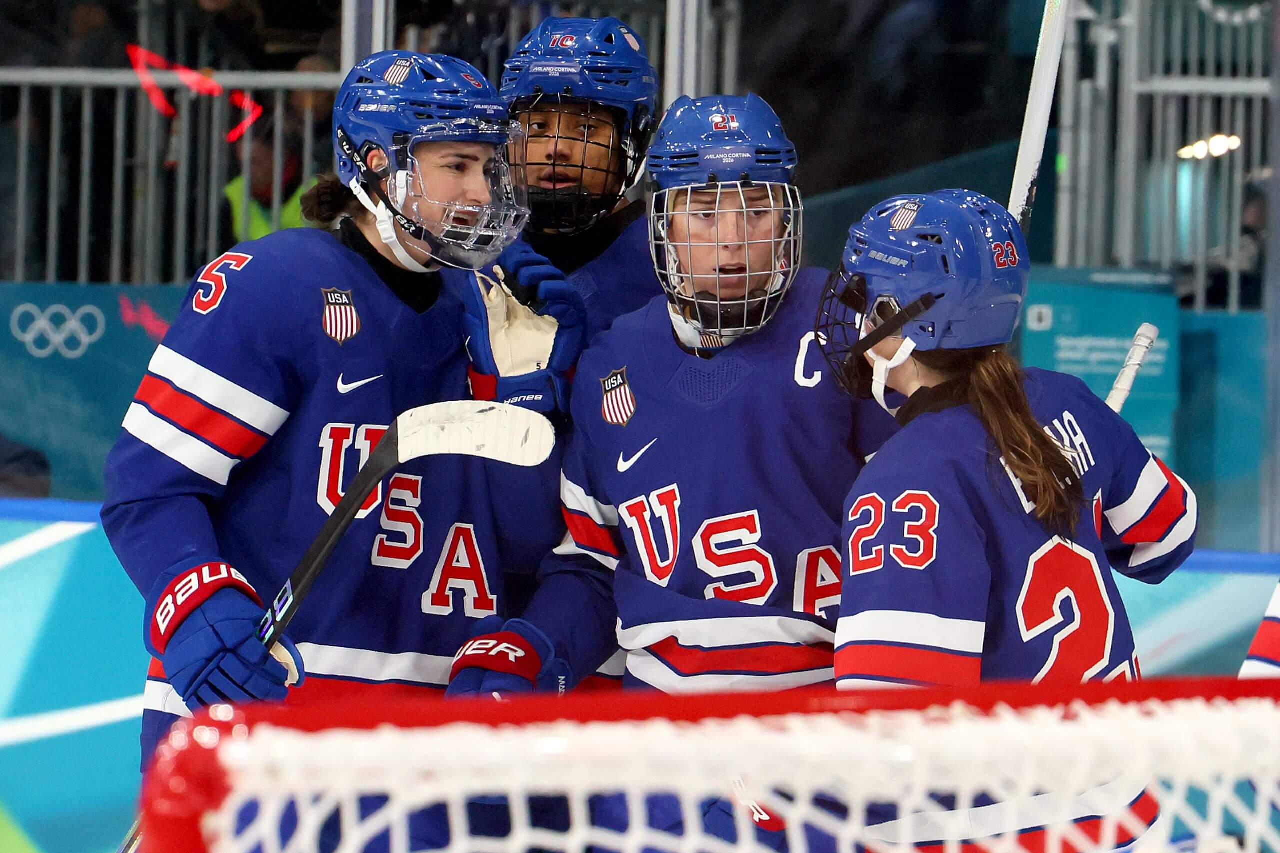 Hilary Knight #21 of Team United States celebrates with teammates after a goal in the second period during the Women's Preliminary Round Group A match between Finland and United States 