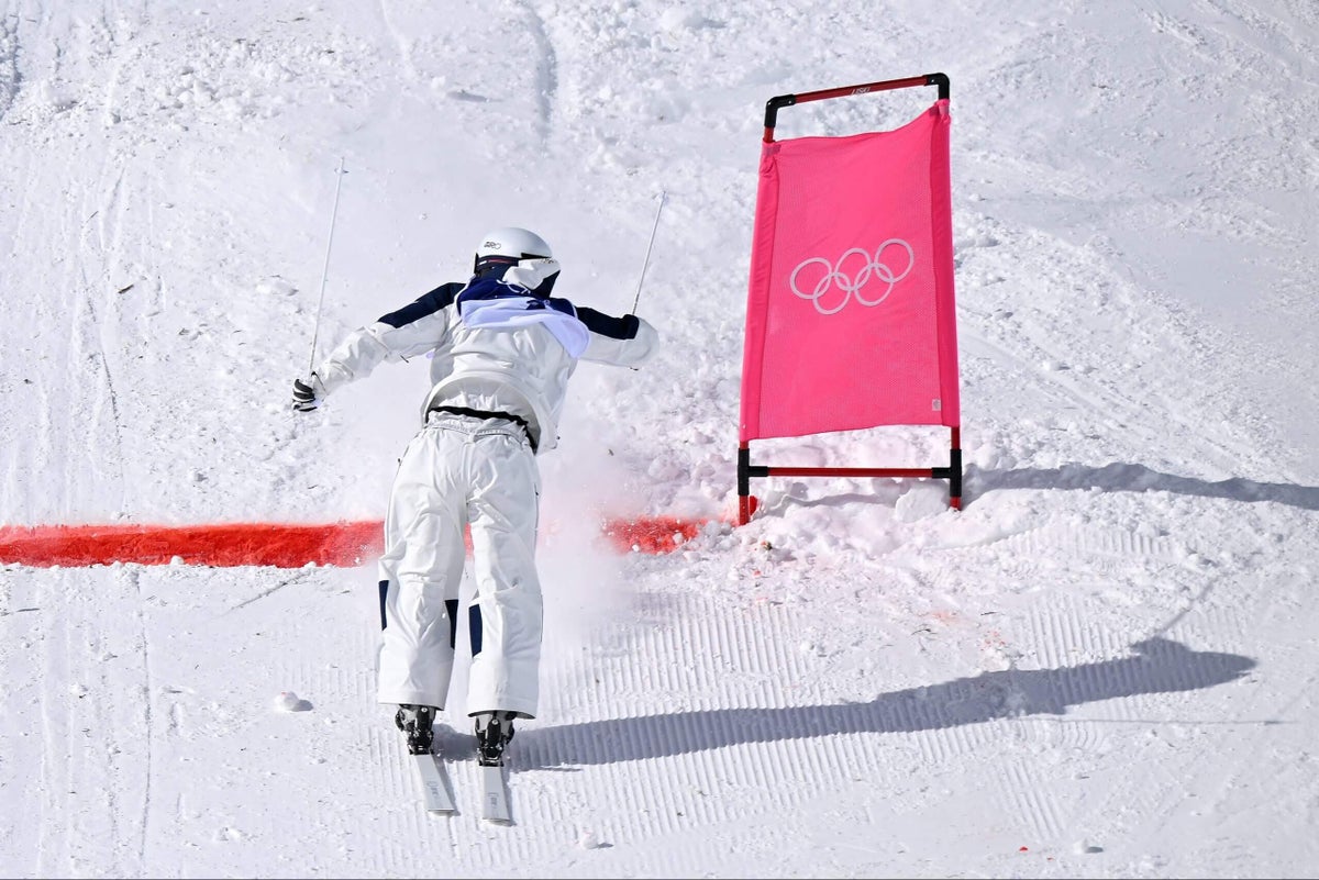 Japan’s Ikuma Horishima finishes wild Olympic dual moguls run backward, wins silver
