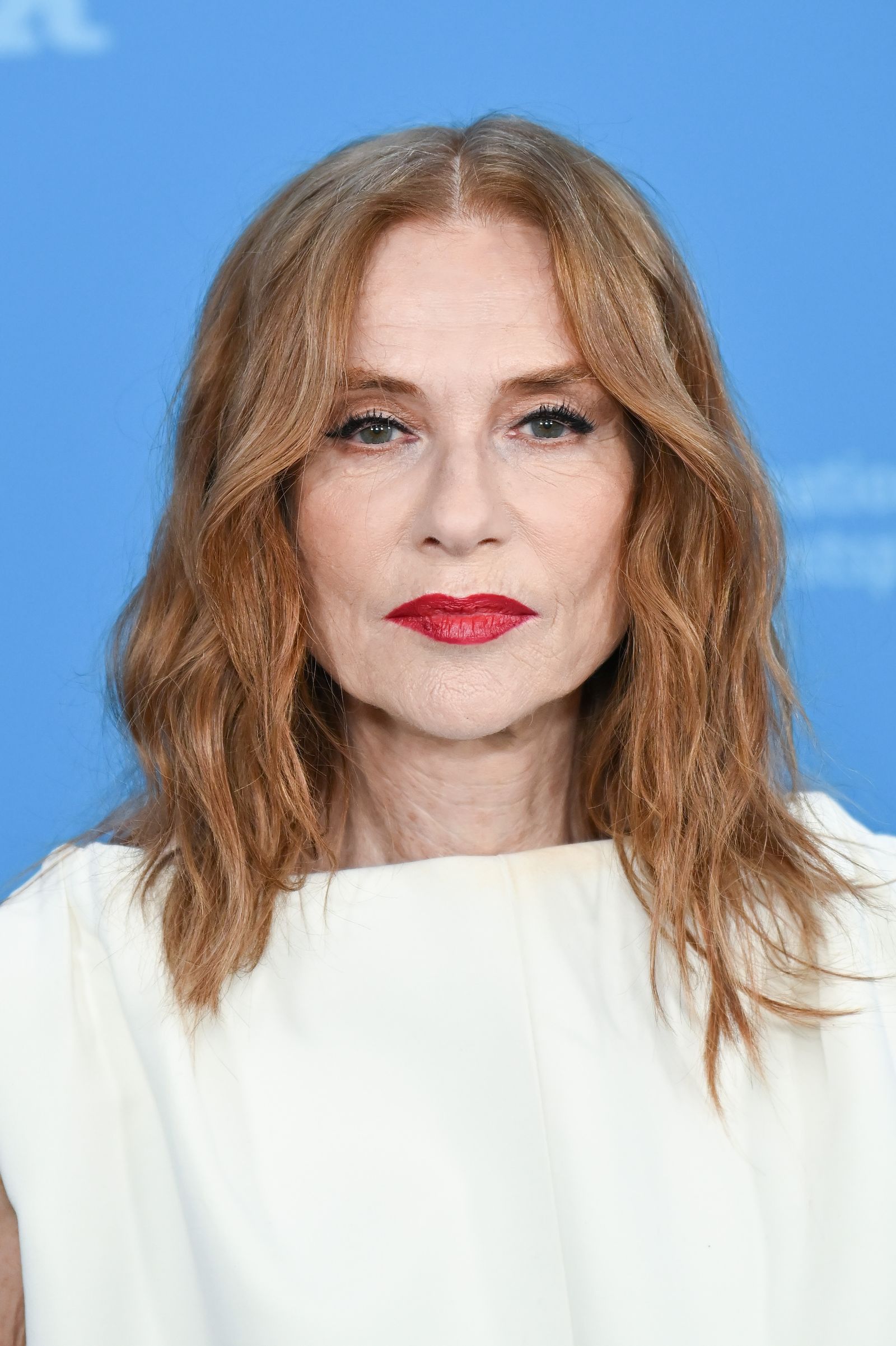 Image may contain Isabelle Huppert Blonde Hair Person Face Head Photography Portrait Adult Cosmetics and Lipstick
