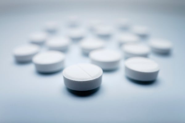 a close up of white circular pills