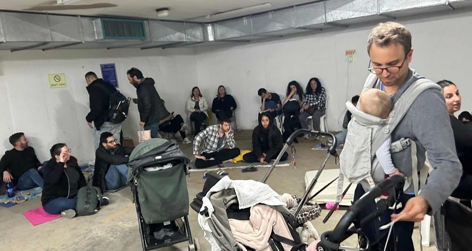 'We meet again': Inside the 'pajama party' at a north Tel Aviv bomb shelter