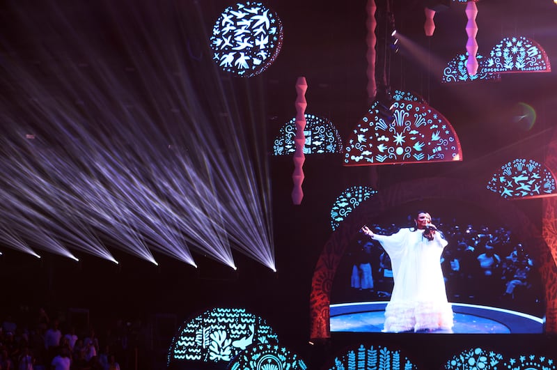 An images of world-renowned vocalist Ivete Sangalo appears on the projection screen as she performs during the "Songs of Hope" tour concert by The Tabernacle Choir and Orchestra at Temple Square at Ginasio do Ibirapuera in São Paulo, Brazil, Friday, Feb. 27, 2026.