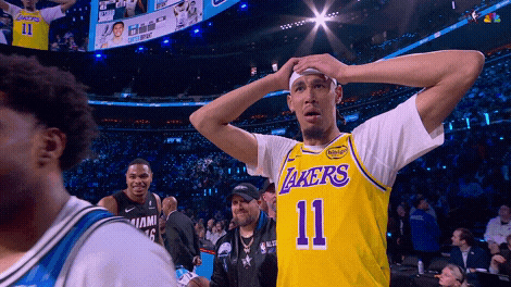 Jaxson Hayes reacts to Carter Bryant's perfect score-achieving dunk.