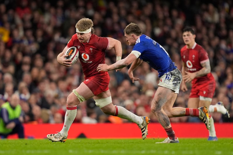 Wales’s Aaron Wainwright and France’s Emilien Gailleton at Principality Stadium on February 15th. Photograph: Andrew Matthews/PA Wire