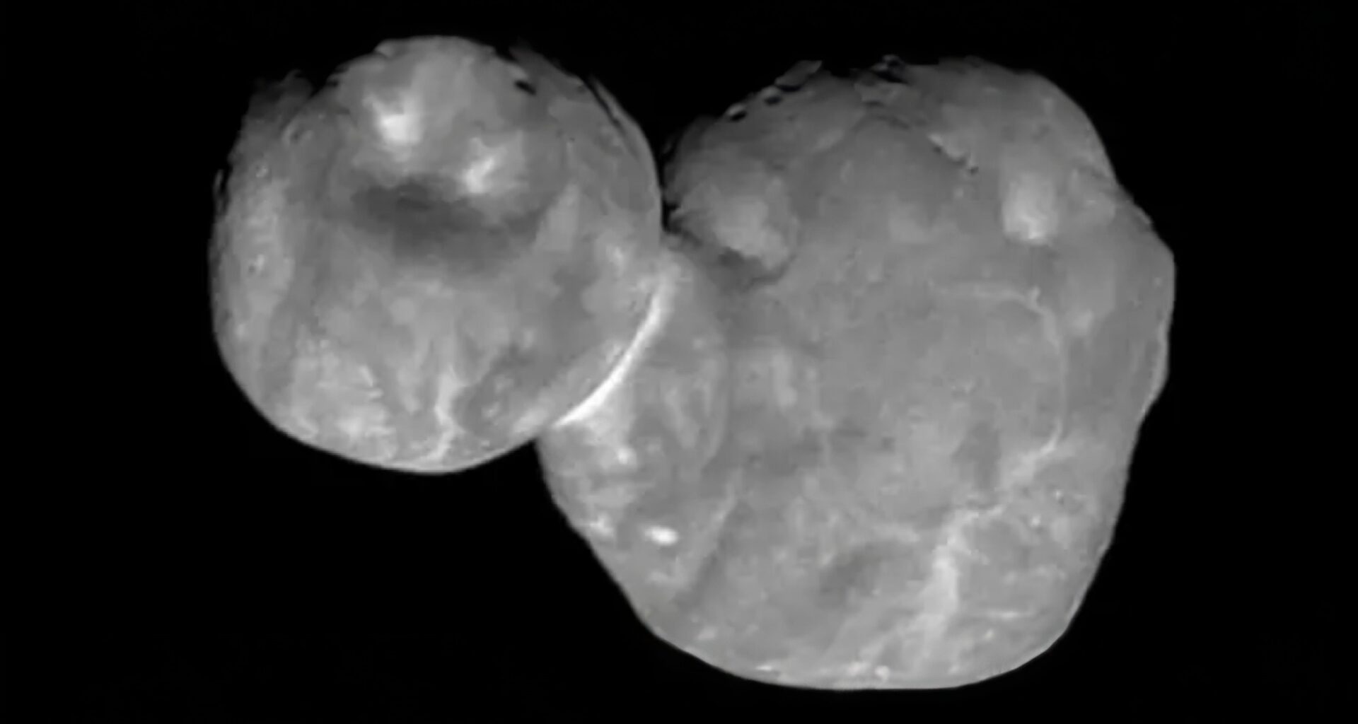 Snowman worlds: How strange shapes appeared in the Kuiper Belt