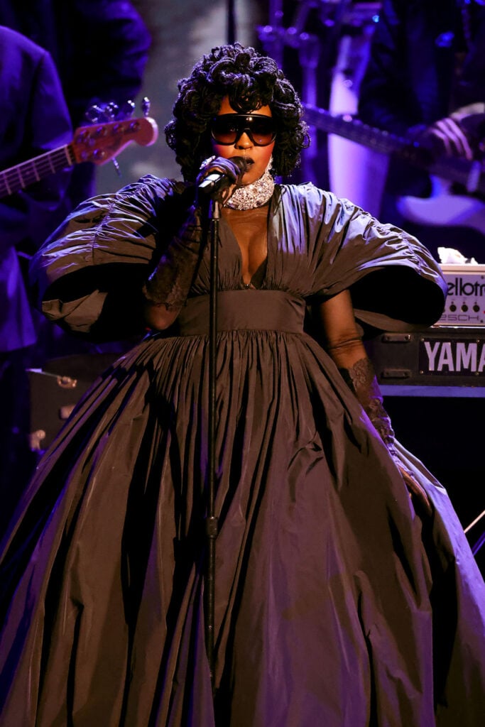 Lauryn Hill and Wyclef Jean perform onstage during the 68th GRAMMY Awards , Lauryn Hill, 2026 Grammys, Grammy Awards tribute, Lauryn Hill performance, Roberta Flack tribute, D’Angelo tribute, Carolina Herrera Spring 2026, Grammys stage fashion, music legacy moment, Grammys ceremony