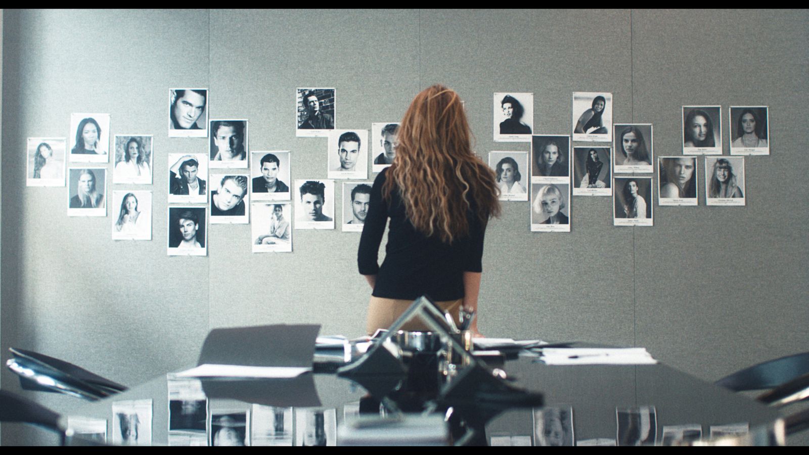 Image may contain Millie Brady Franco Citti Naima Akef Furniture Table Adult Person Desk Indoors Face and Head