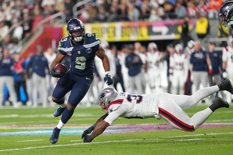 Seattle Seahawks running back Kenneth Walker avoids a tackle on his way to being named MVP in the Super Bowl. Photograph: Doug Mills/The New York Times                    