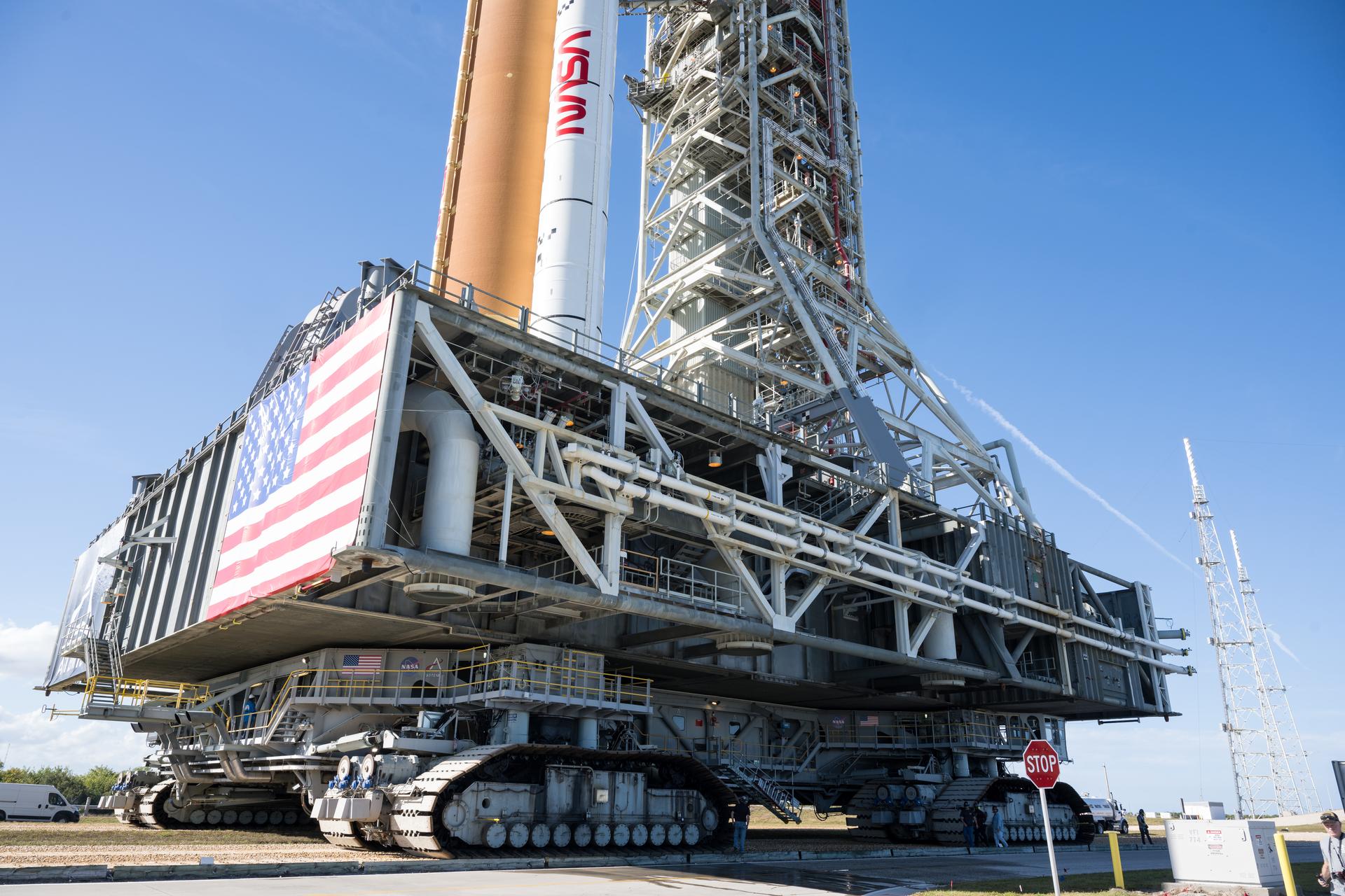 NASA's crawler-transporter carries the Artemis II Space Launch System rocket and Orion spacecraft toward Launch Pad 39B on Jan. 17, 2026.