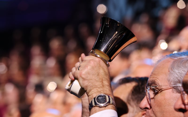 Bob Hillyer swings a bell and sings during a rehearsal of the "Songs of Hope" tour concert by The Tabernacle Choir and Orchestra at Temple Square at Ginasio do Ibirapuera in São Paulo, Brazil, Thursday, Feb. 26, 2026.