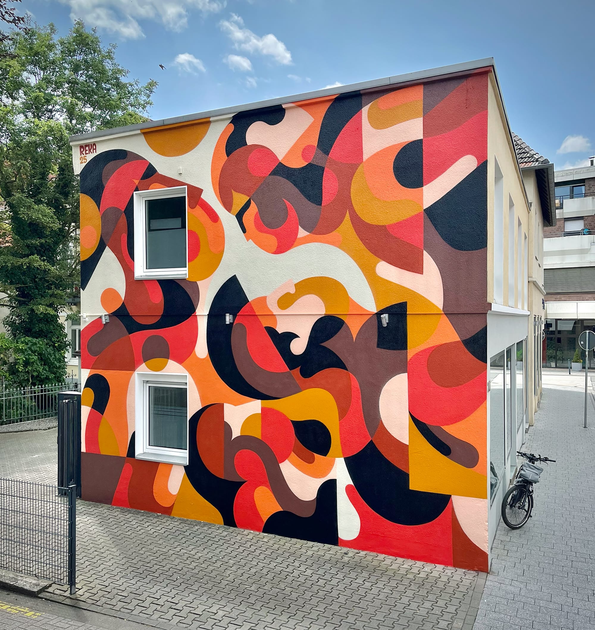 a vibrant abstracted mural by James Reka