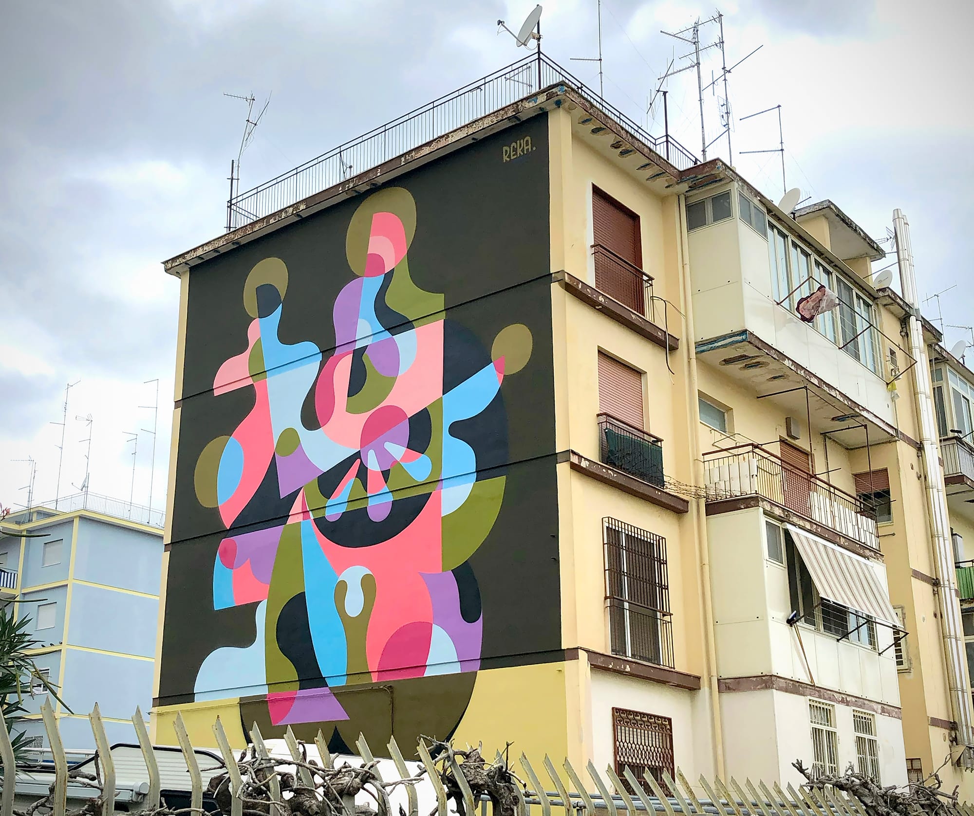 a vibrant abstracted mural by James Reka